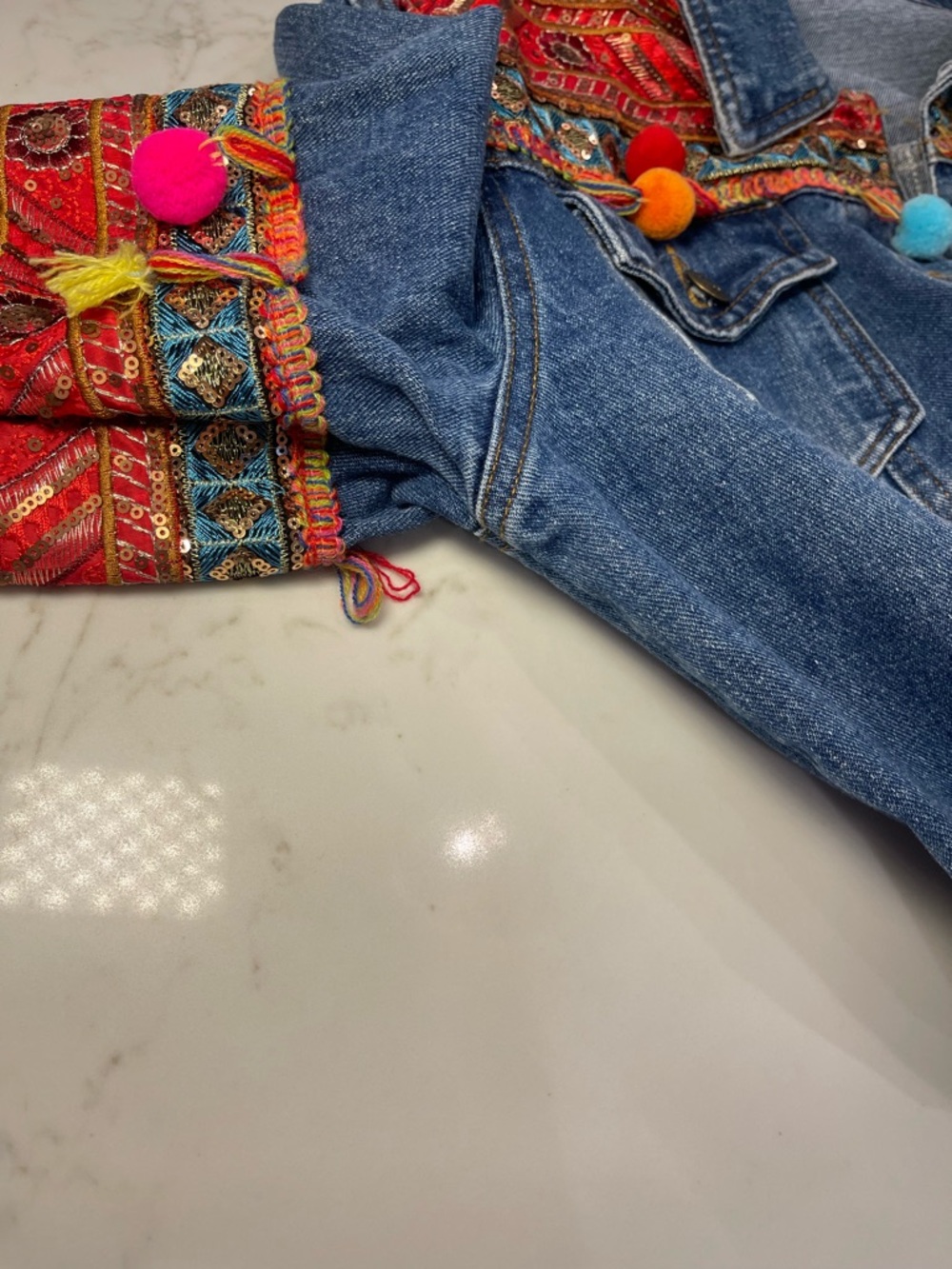 Velzera Women’s Denim Jacket with Multicolor Embroidered Panels and Pom-Poms - Picture 14 of 16